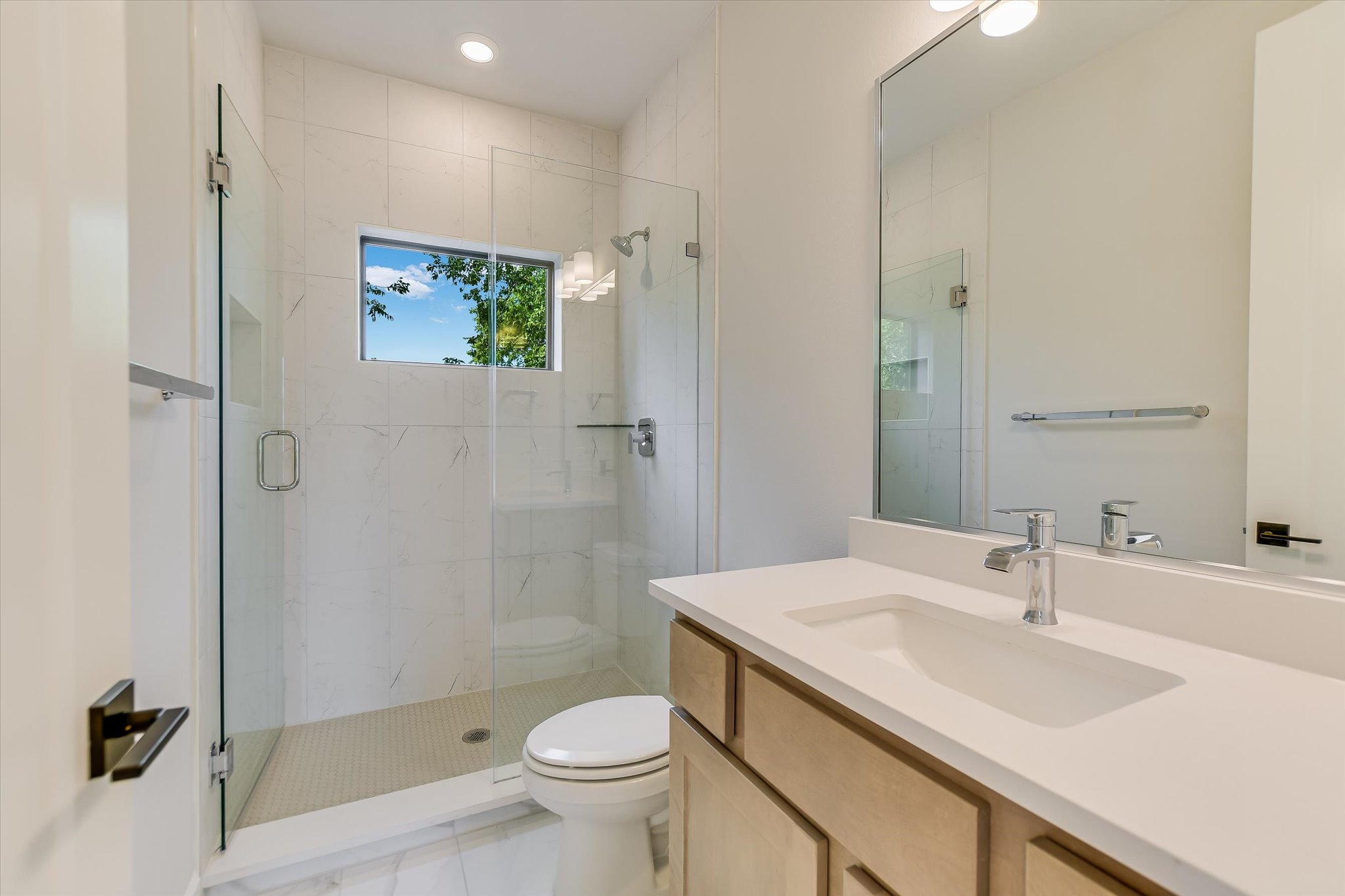 114 Lightsey Road, Unit 2 Austin, TX 78704 - Photo 10 of 14 Bathroom with a marble finish shower, vanity, and recessed lighting