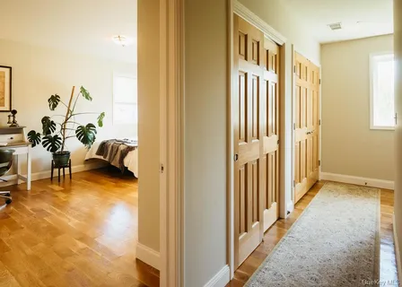 a view of a livingroom with furniture and front door