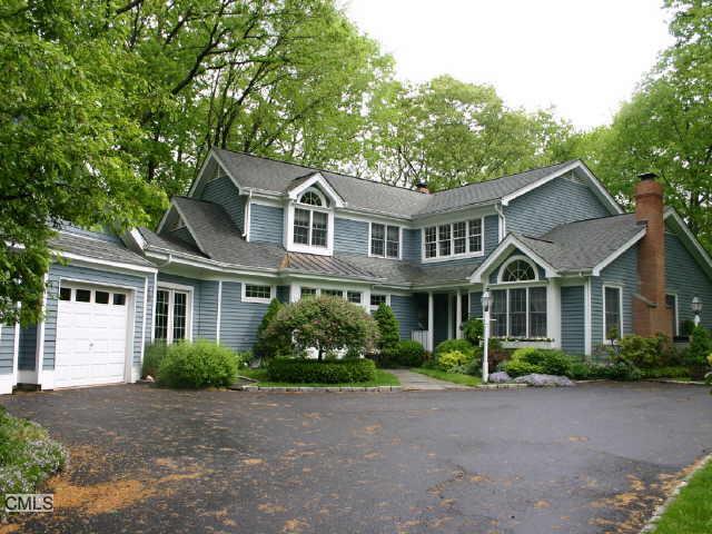 2 Quarry Way Wilton, CT 06897 - Photo 1 of 1 a front view of a house with a garden