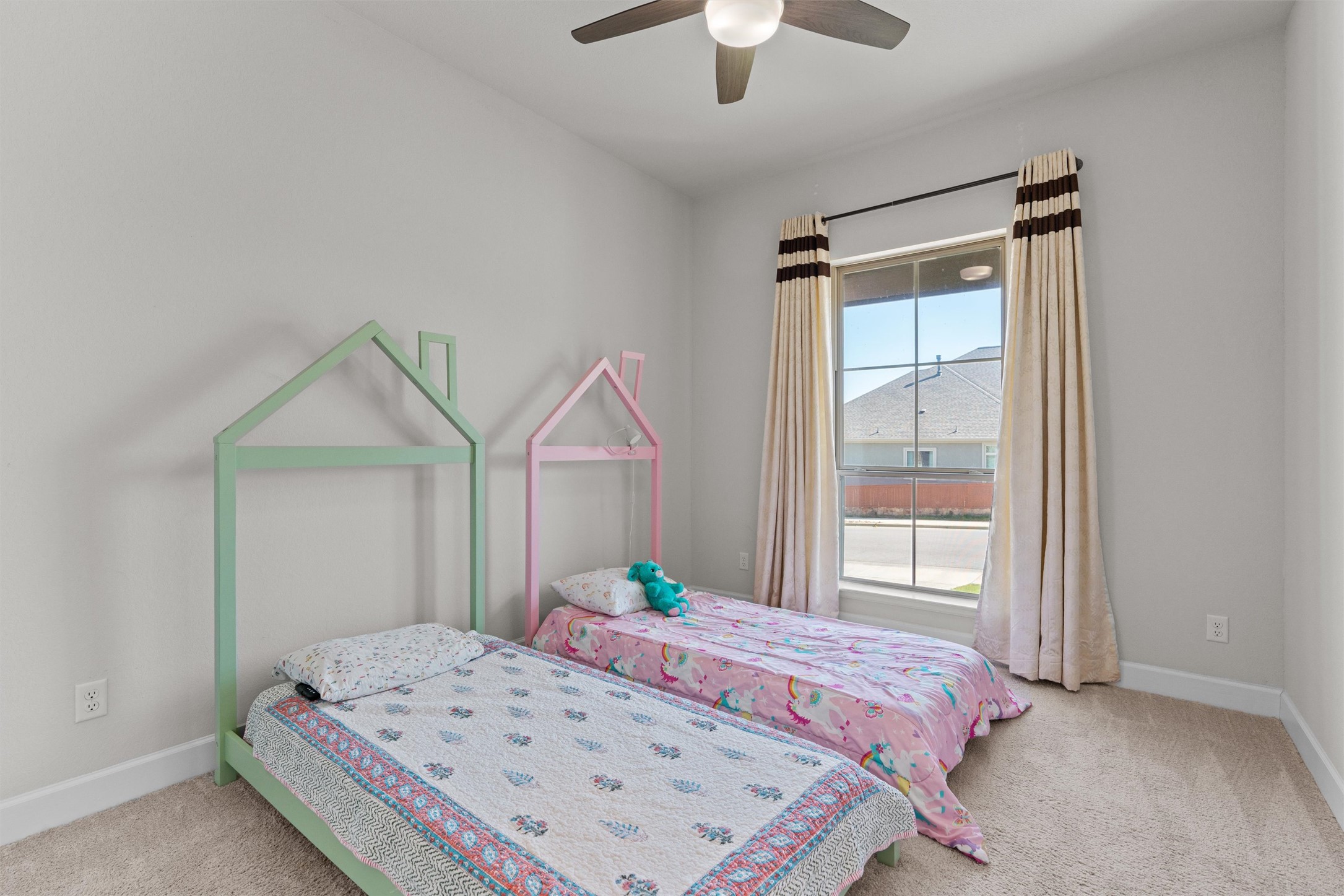 101 Pienza Drive Georgetown, TX 78628 - Photo 31 of 40 a bedroom with a bed and a window