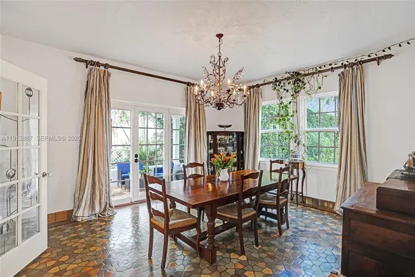a kitchen with stainless steel appliances a sink stove and refrigerator