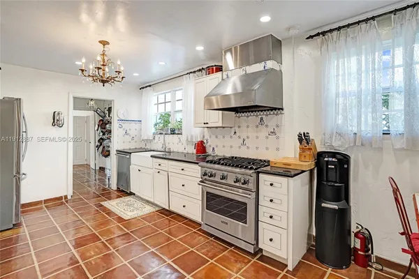 a bathroom with a double vanity sink and mirror