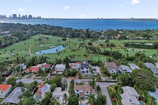 an aerial view of a house with a garden and plants