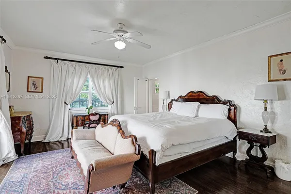 a front view of a house with yard and green space