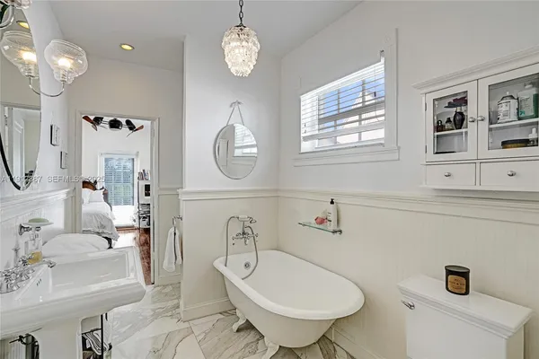 a view of a livingroom with furniture and front door