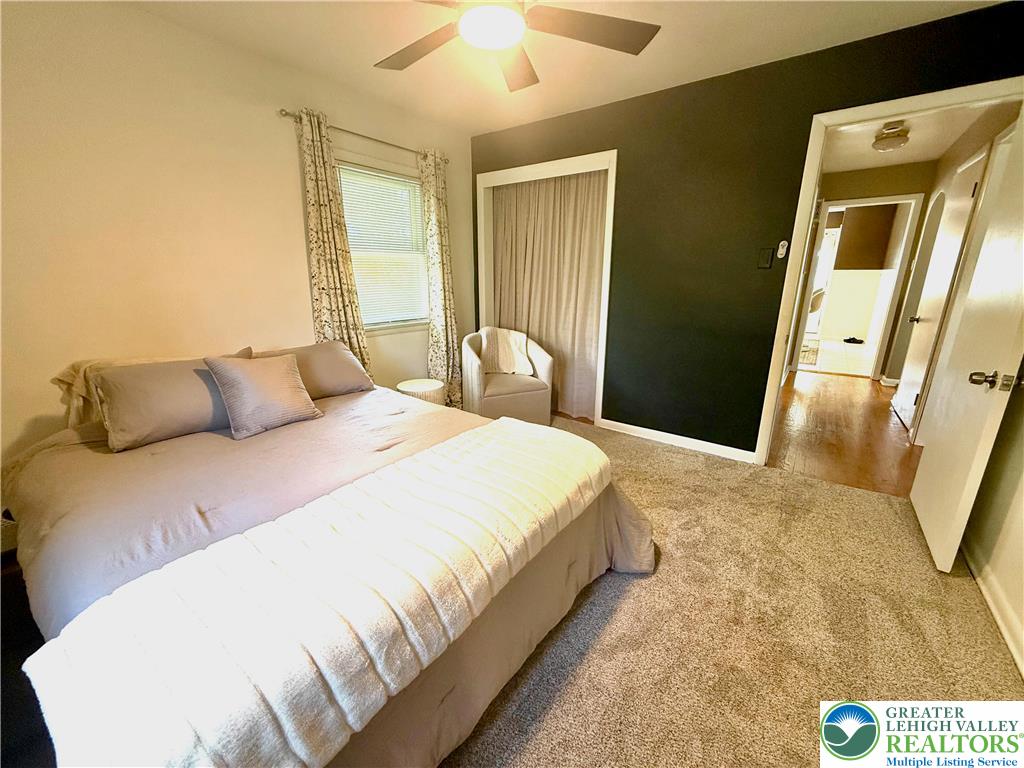 2701 Nazareth Road Easton, PA 18045 - Photo 11 of 13 a bedroom with a bed and a mirror