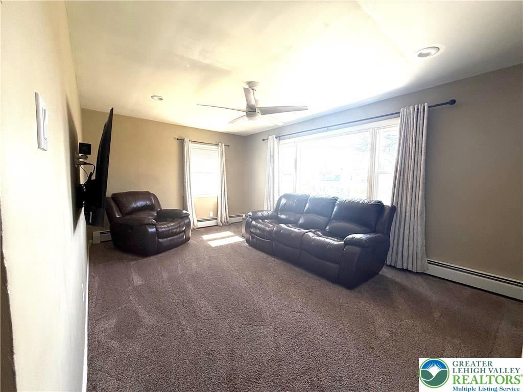 2701 Nazareth Road Easton, PA 18045 - Photo 9 of 13 a living room with furniture and a window