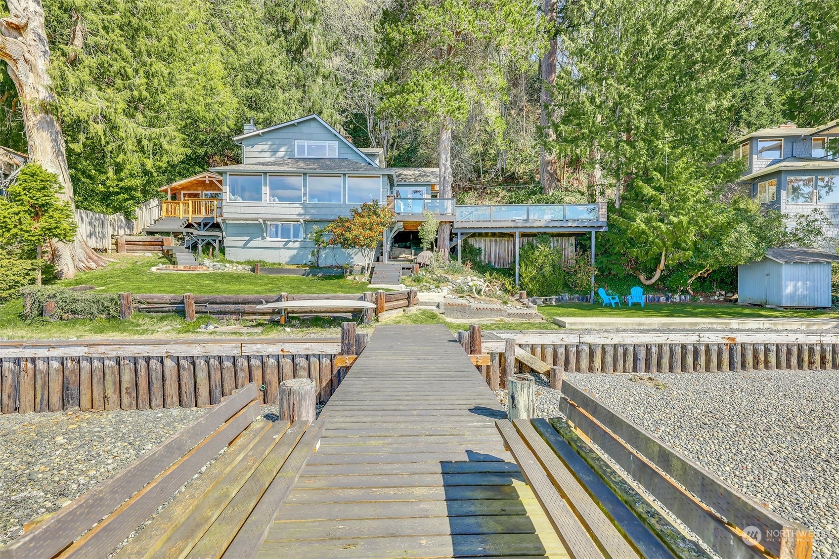 13307 Burma Road Southwest Vashon, WA 98070 - Photo 4 of 39 a view of a house with backyard and deck