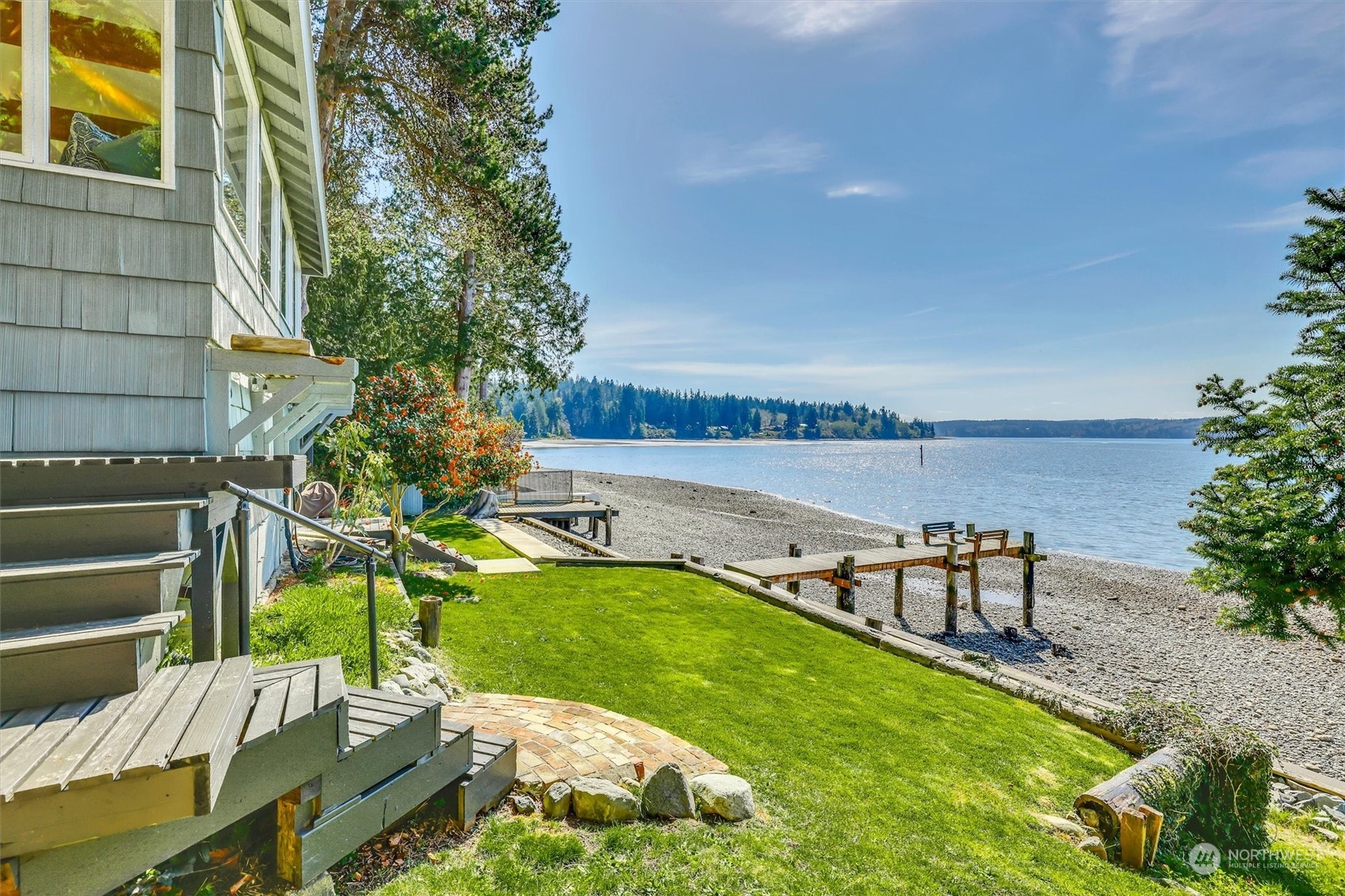 13307 Burma Road Southwest Vashon, WA 98070 - Photo 5 of 39 a view of a swimming pool with a patio and a yard