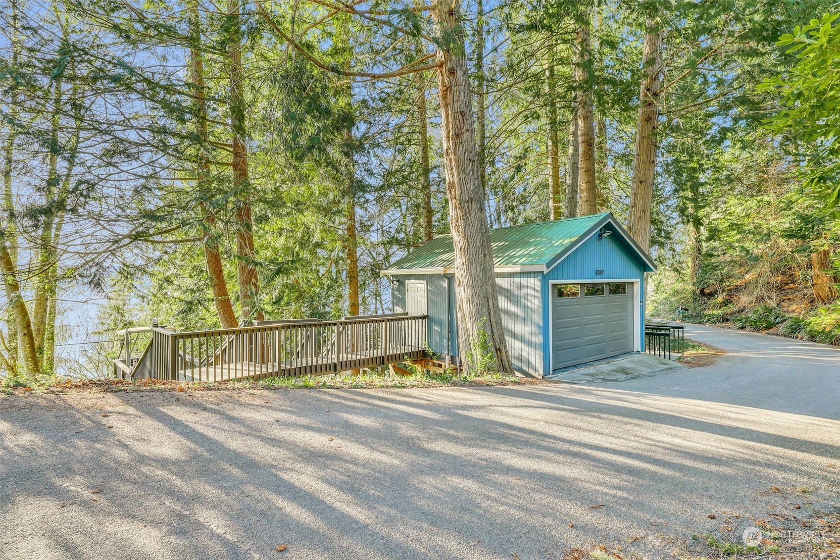 13307 Burma Road Southwest Vashon, WA 98070 - Photo 8 of 39 a view of a house with large trees