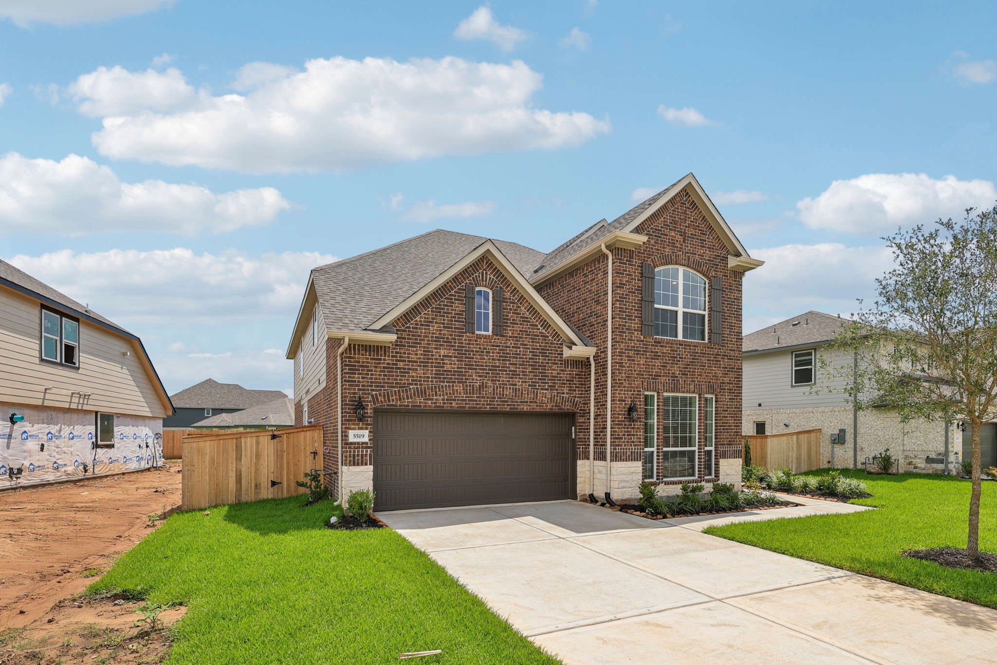 5519 Handlewood Lane Rosenberg, TX 77471 - Photo 2 of 38 a front view of house with yard and green space