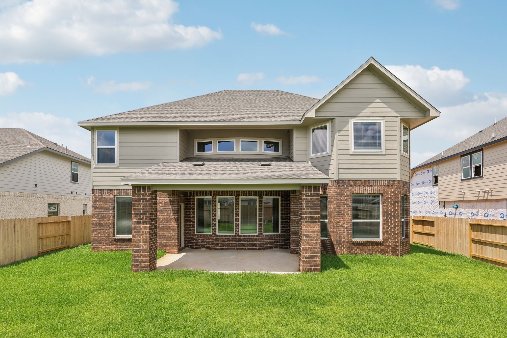 5519 Handlewood Lane Rosenberg, TX 77471 - Photo 35 of 38 a front view of a house with a yard