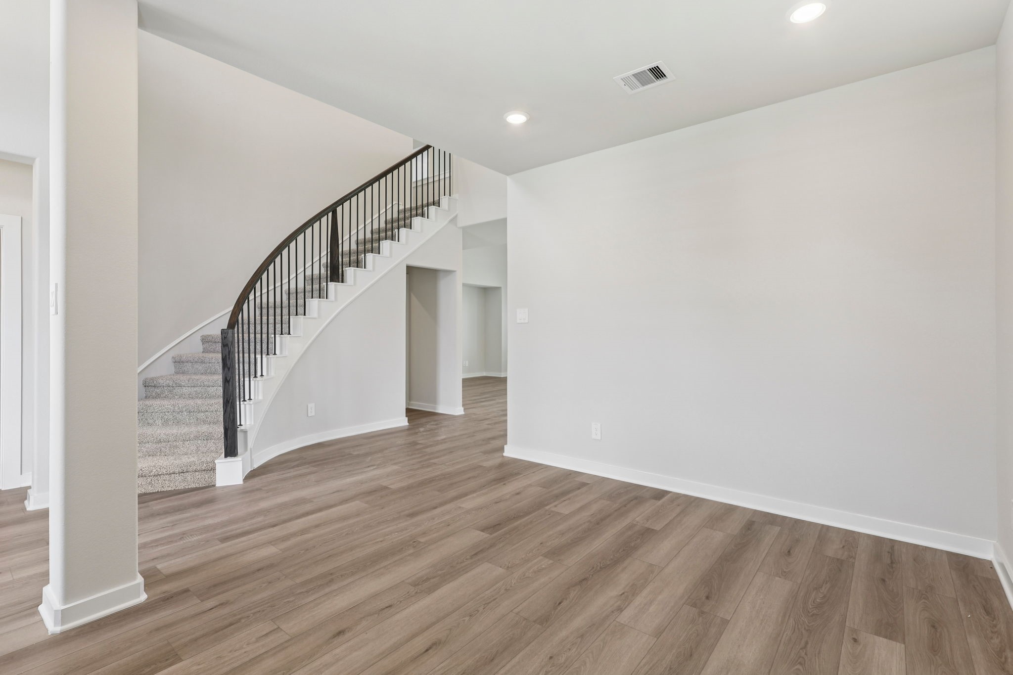 5519 Handlewood Lane Rosenberg, TX 77471 - Photo 4 of 38 a view of entryway with wooden floor