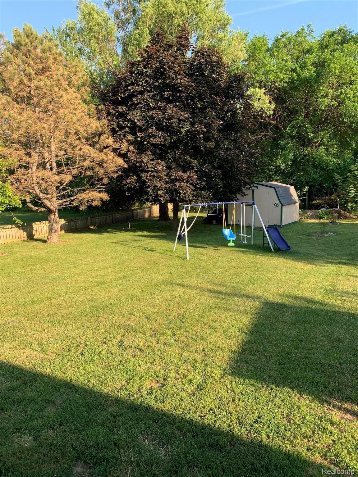8912 McColl Road Brighton, MI 48116 - Photo 13 of 17 mccoll backyard 2.jpeg