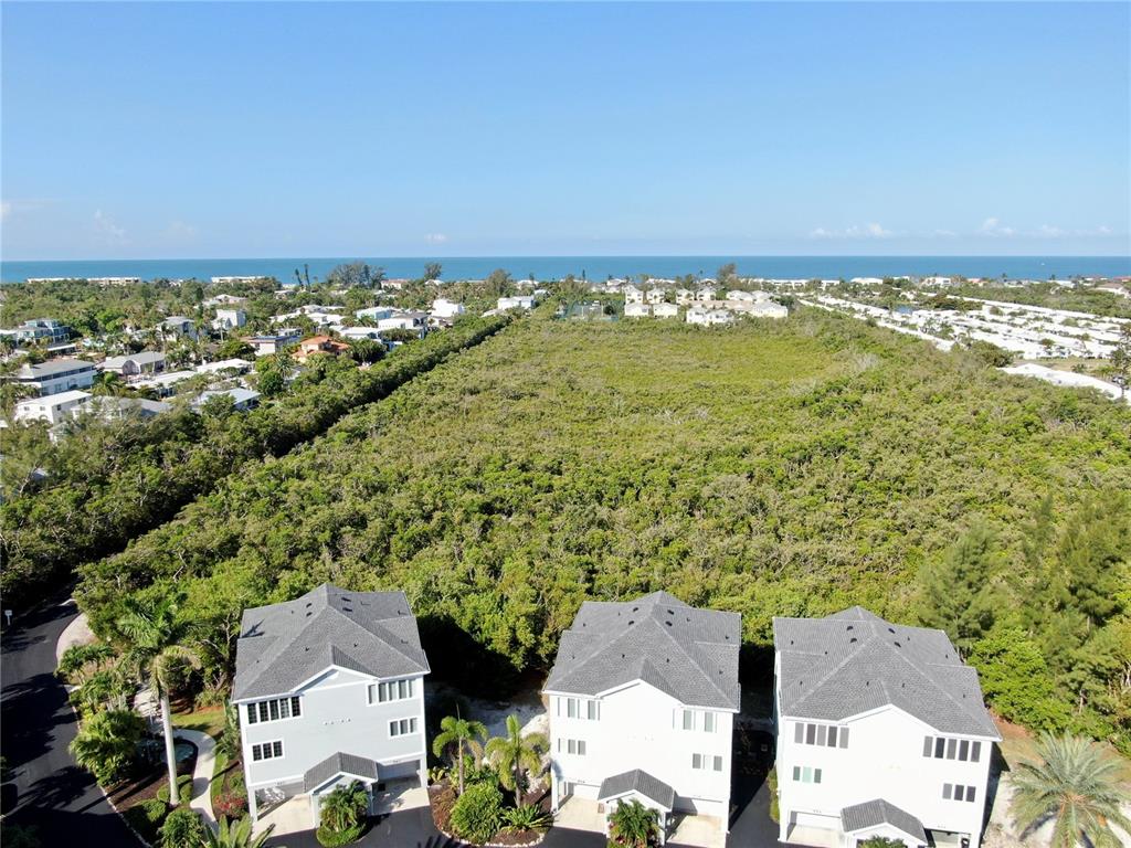848 Evergreen Way Longboat Key, FL 34228 - Photo 42 of 66 an aerial view of residential houses with outdoor space