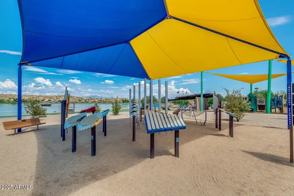 a view of a lake with a building in the background