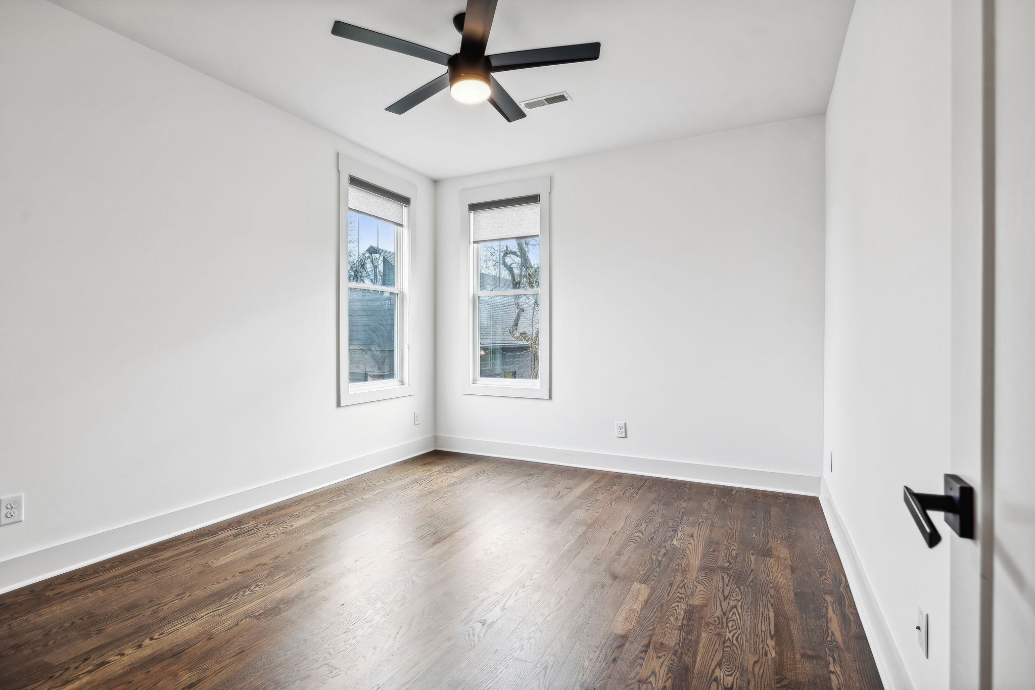 159 Acton Street Franklin, TN 37064 - Photo 49 of 70 a view of empty room with wooden floor and fan