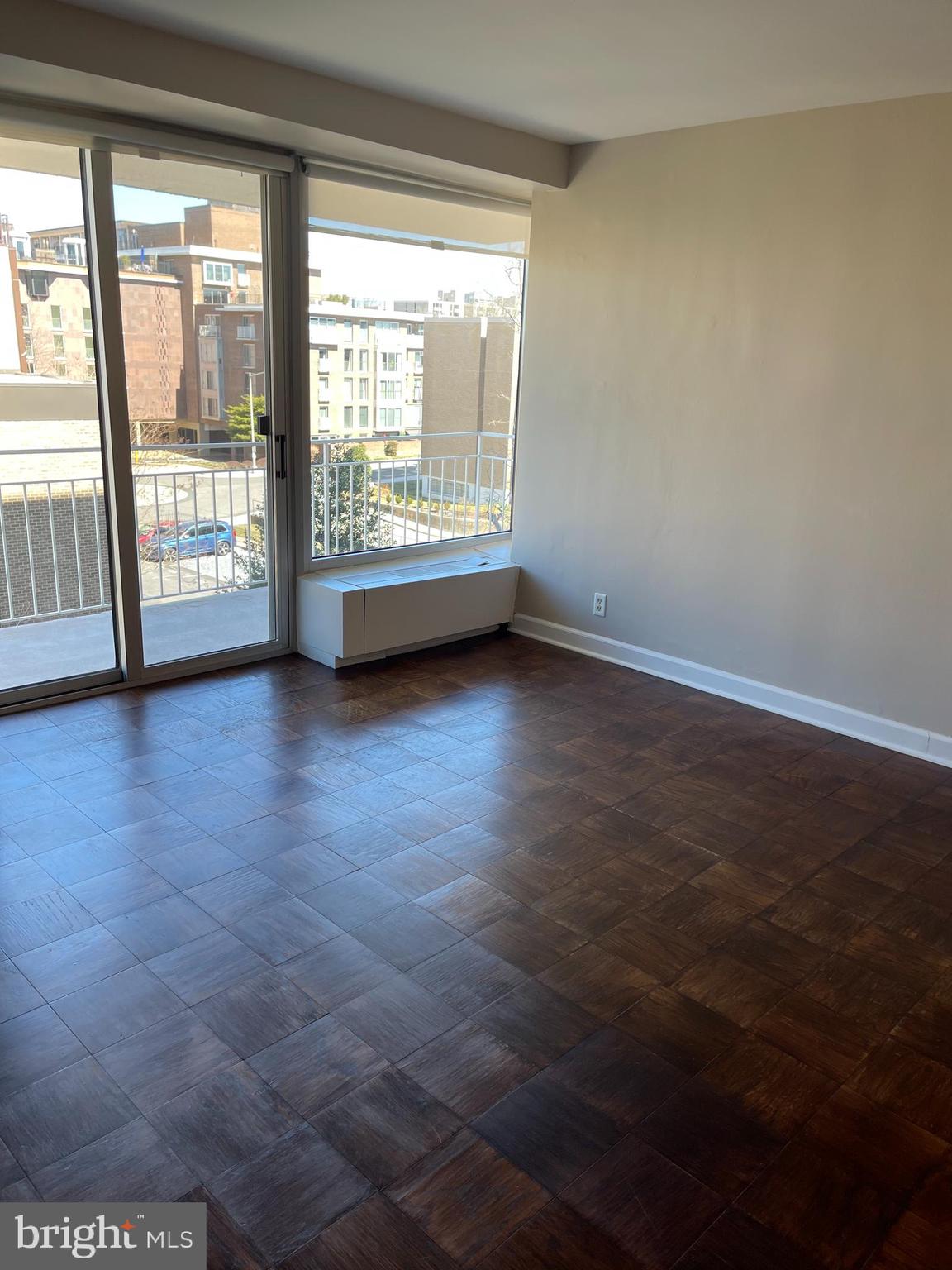 1425 4th Street Southwest, Unit A212 Washington, DC 20024 - Photo 16 of 48 wooden floor in an empty room with a window