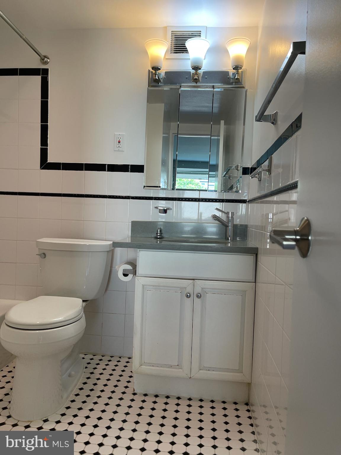 1425 4th Street Southwest, Unit A212 Washington, DC 20024 - Photo 21 of 48 a bathroom with a toilet and a shower