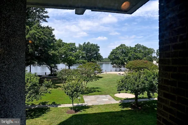 a view of a street next to a lake view