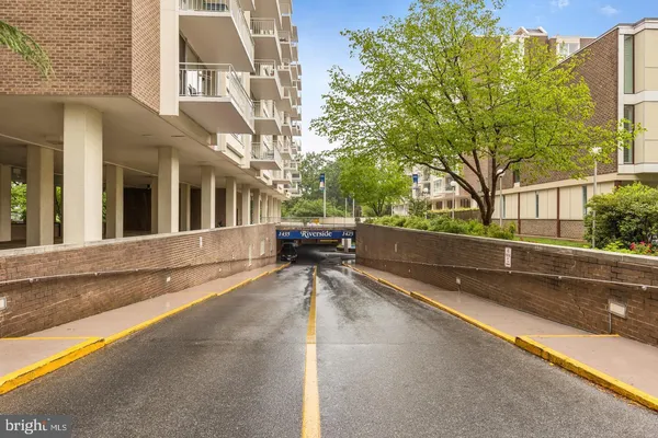 a view of a building with a large trees