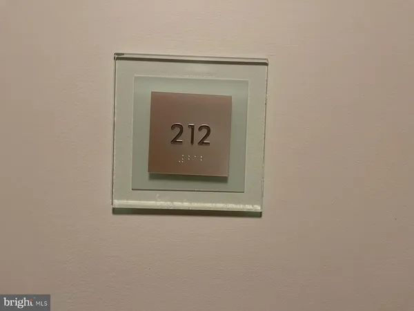 a bathroom with a sink a toilet and a shower