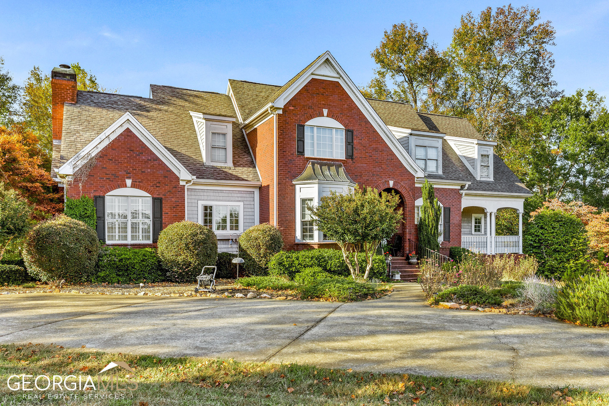 1395 Berea Road Commerce, GA 30530 - Photo 1 of 1 a front view of a house with a yard