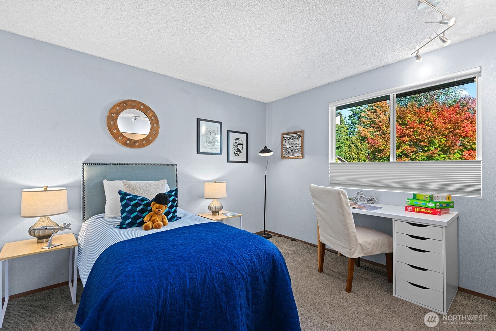 2604 177th Street Southeast Bothell, WA 98012 - Photo 19 of 35 a bedroom with a bed and a window