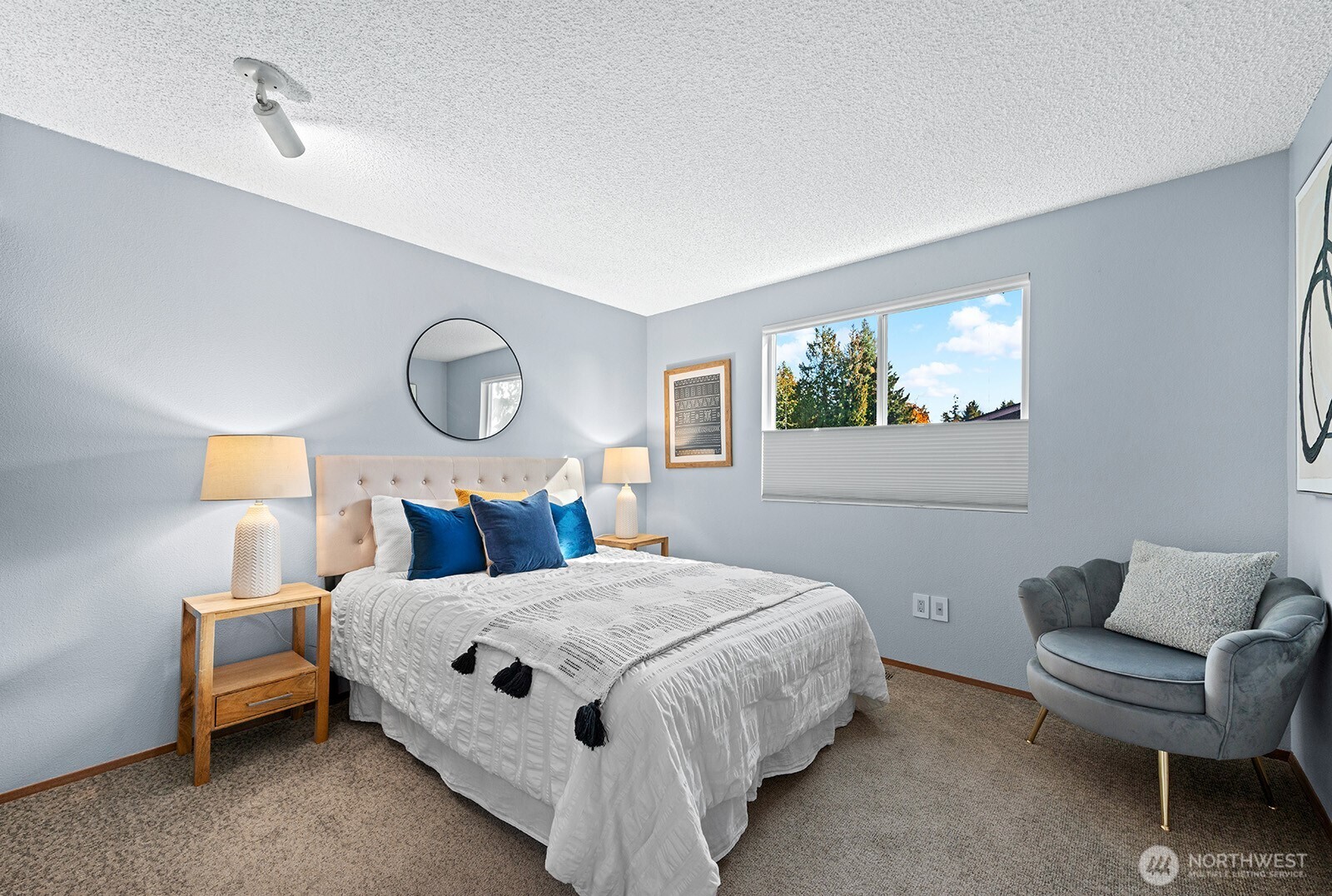 2604 177th Street Southeast Bothell, WA 98012 - Photo 20 of 35 a bedroom with a bed and a couch