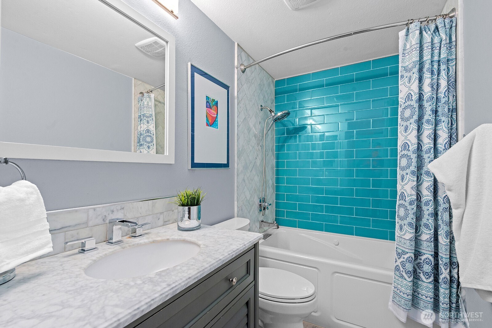 2604 177th Street Southeast Bothell, WA 98012 - Photo 21 of 35 a bathroom with a granite countertop sink toilet and shower