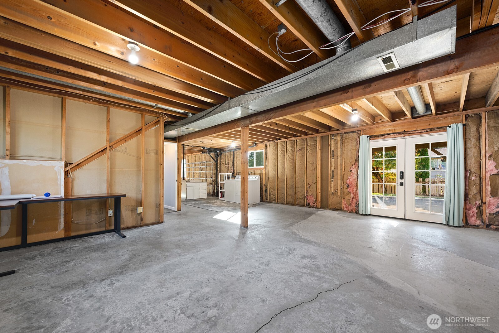 2604 177th Street Southeast Bothell, WA 98012 - Photo 22 of 35 a view of empty room with wooden floor