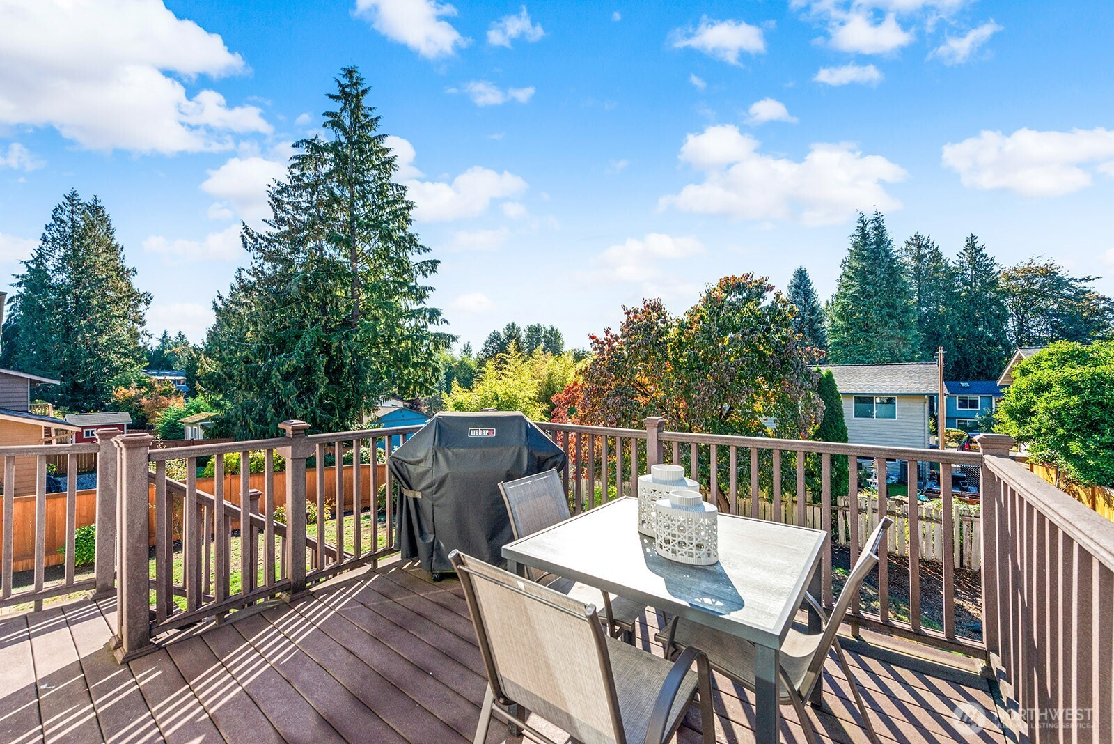2604 177th Street Southeast Bothell, WA 98012 - Photo 27 of 35 a balcony with wooden floor and outdoor seating