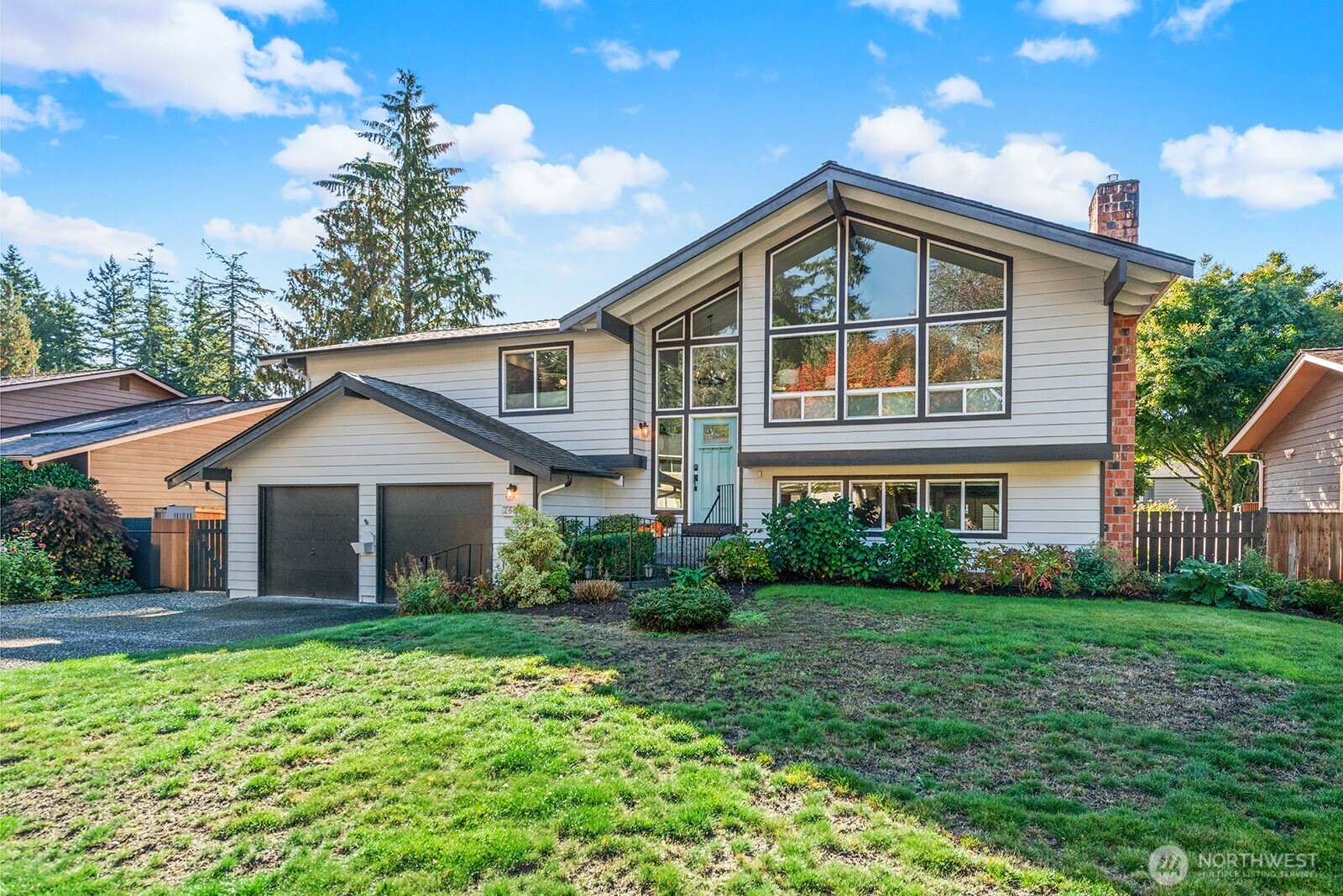 2604 177th Street Southeast Bothell, WA 98012 - Photo 34 of 35 a front view of a house with a yard