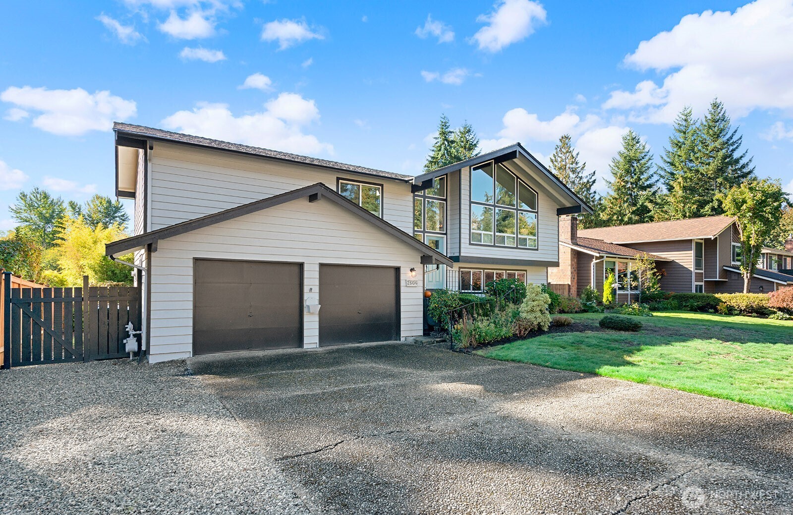 2604 177th Street Southeast Bothell, WA 98012 - Photo 35 of 35 a front view of a house with a yard and garage