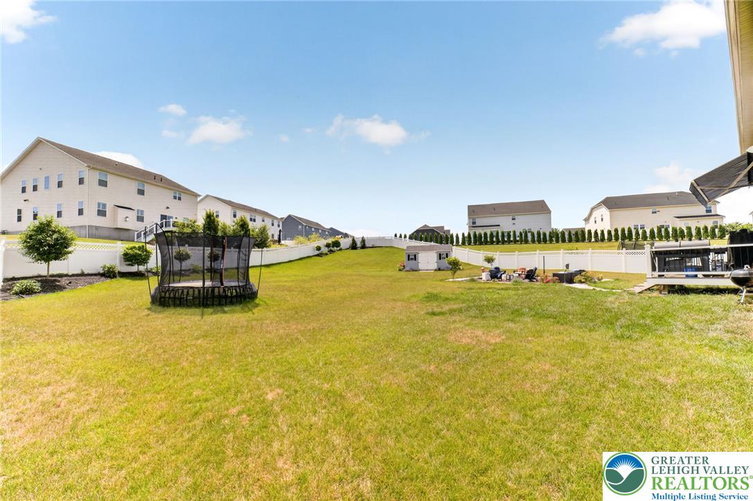 3952 Orth Street Bethlehem, PA 18020 - Photo 52 of 60 A spacious, tiered yard awaits, offering ample room for recreation and outdoor enjoyment.