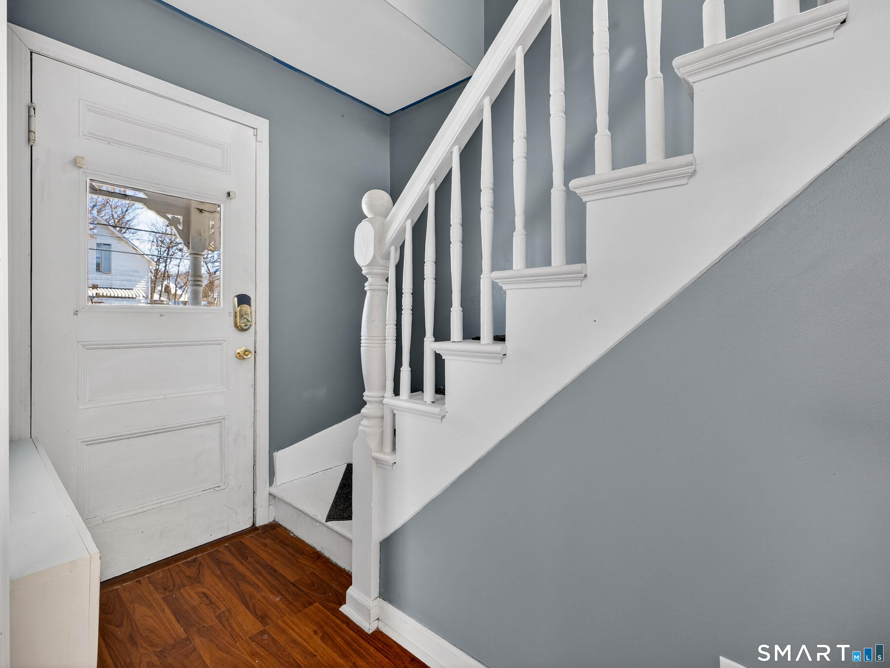 82 North Street Norwich, CT 06360 - Photo 13 of 38 a view of entryway and hall with wooden floor