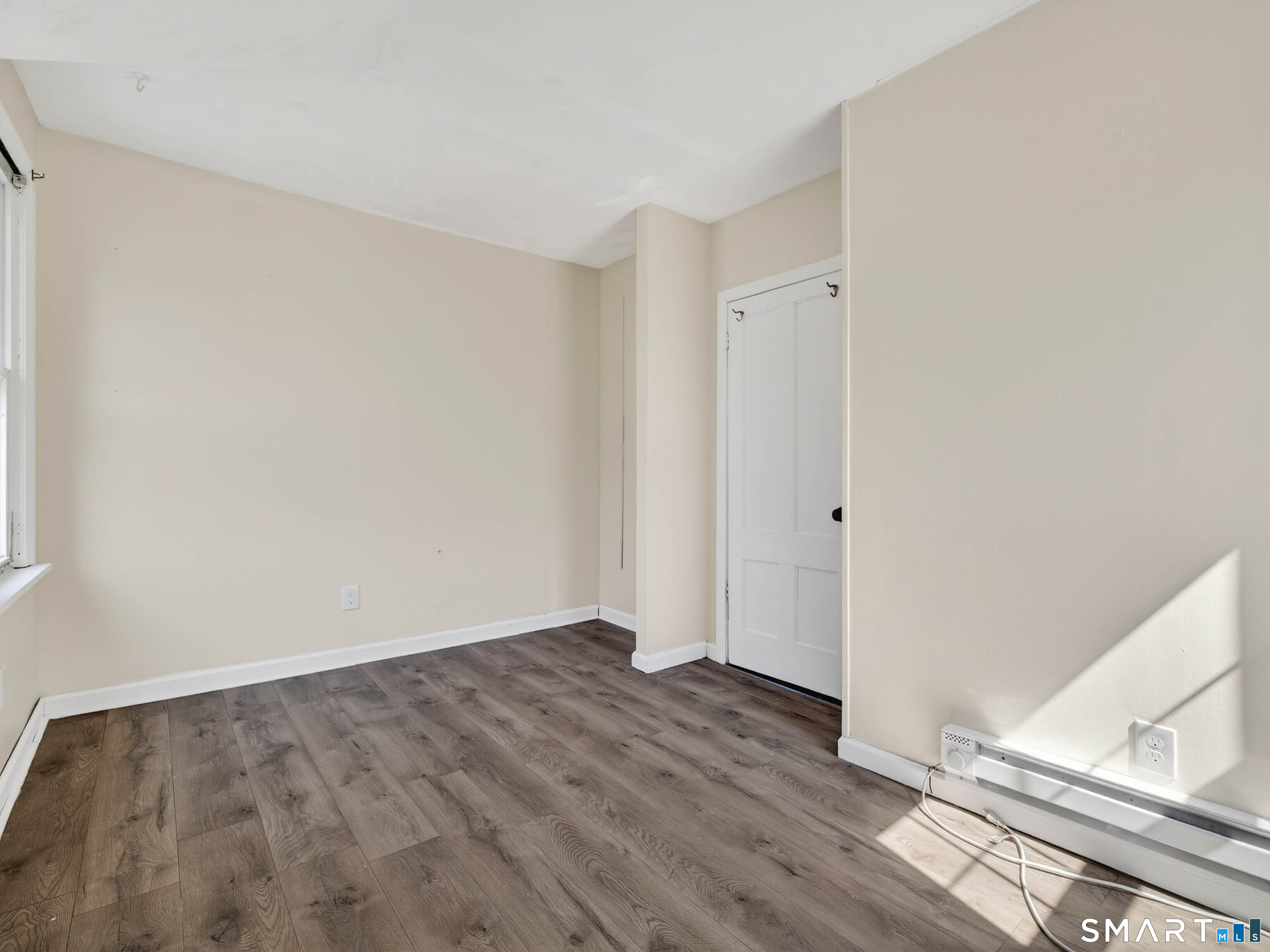 82 North Street Norwich, CT 06360 - Photo 20 of 38 a view of a room with wooden floor