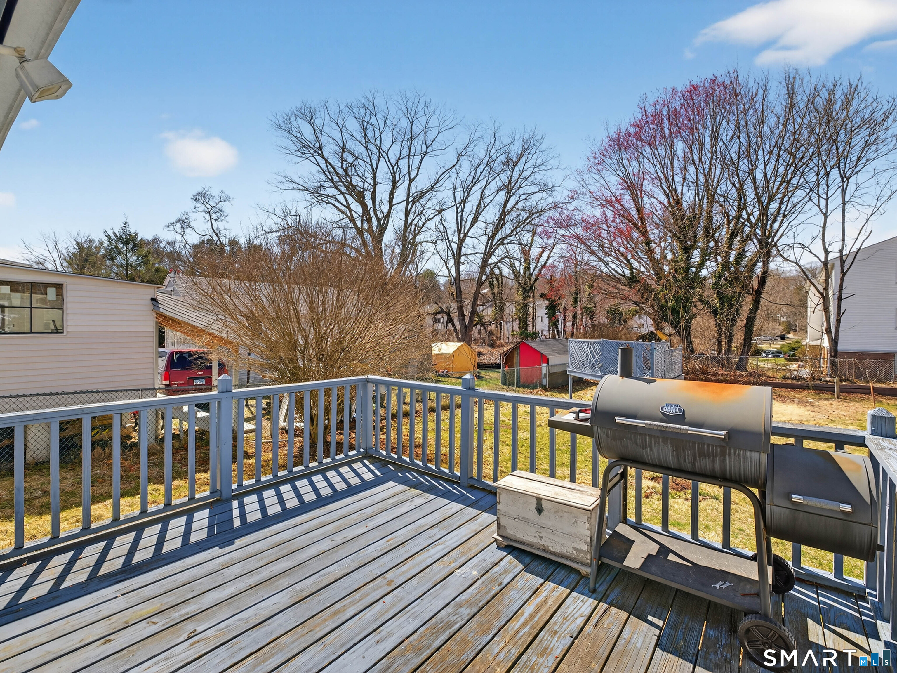 82 North Street Norwich, CT 06360 - Photo 27 of 38 a view of a house with wooden deck