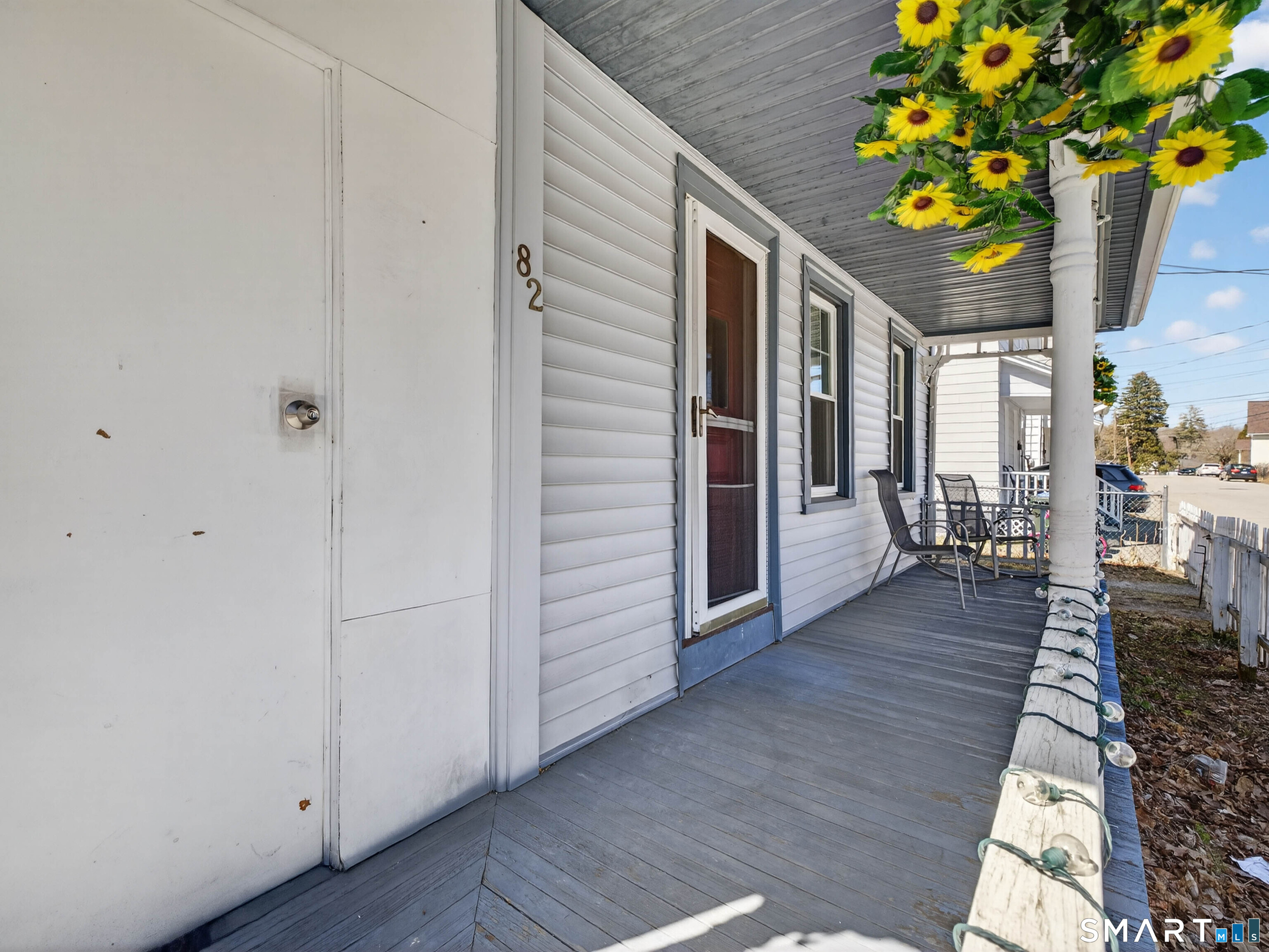 82 North Street Norwich, CT 06360 - Photo 34 of 38 a porch with wooden floor