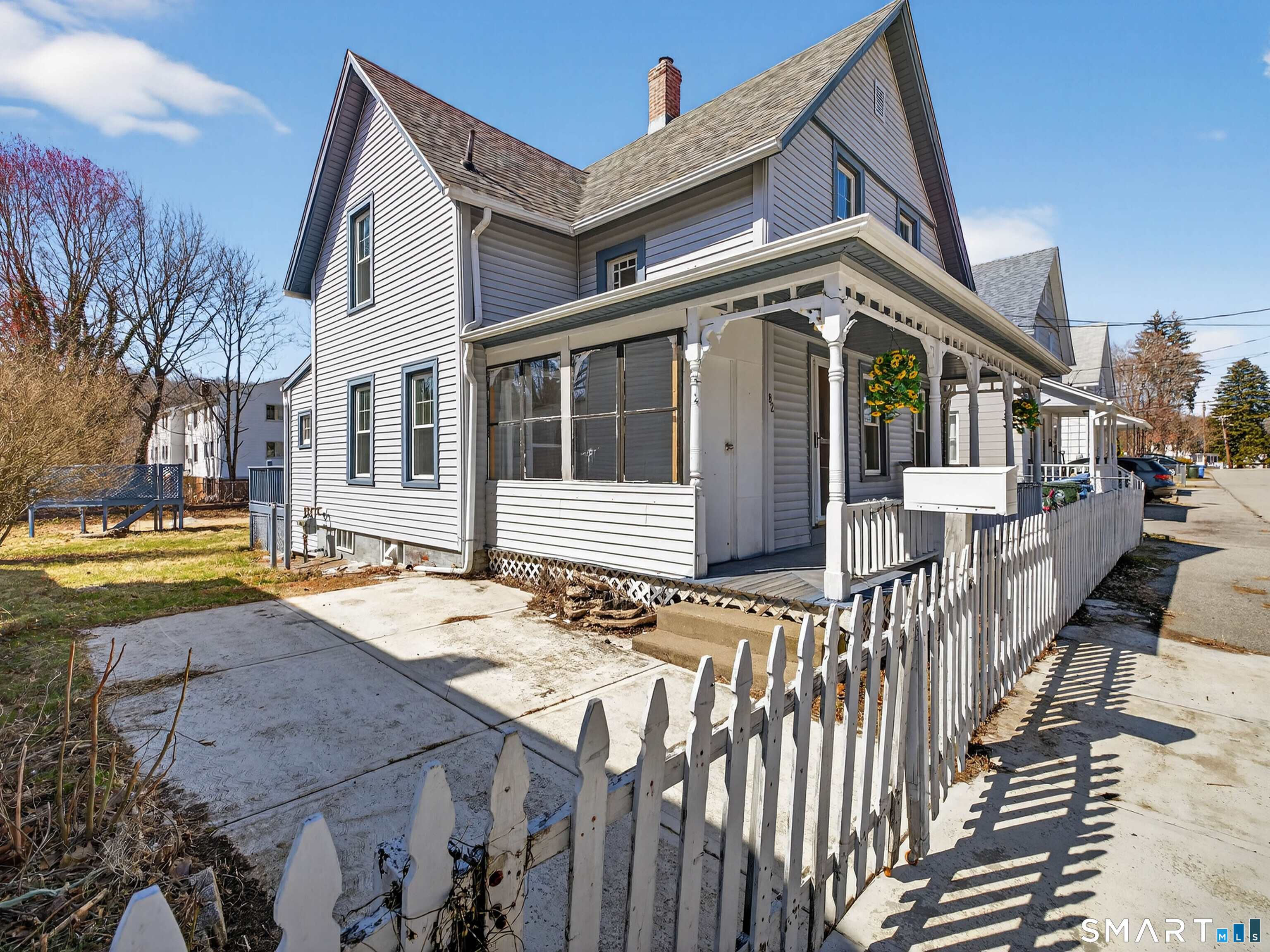 82 North Street Norwich, CT 06360 - Photo 35 of 38 a view of a house with wooden floor and a fence