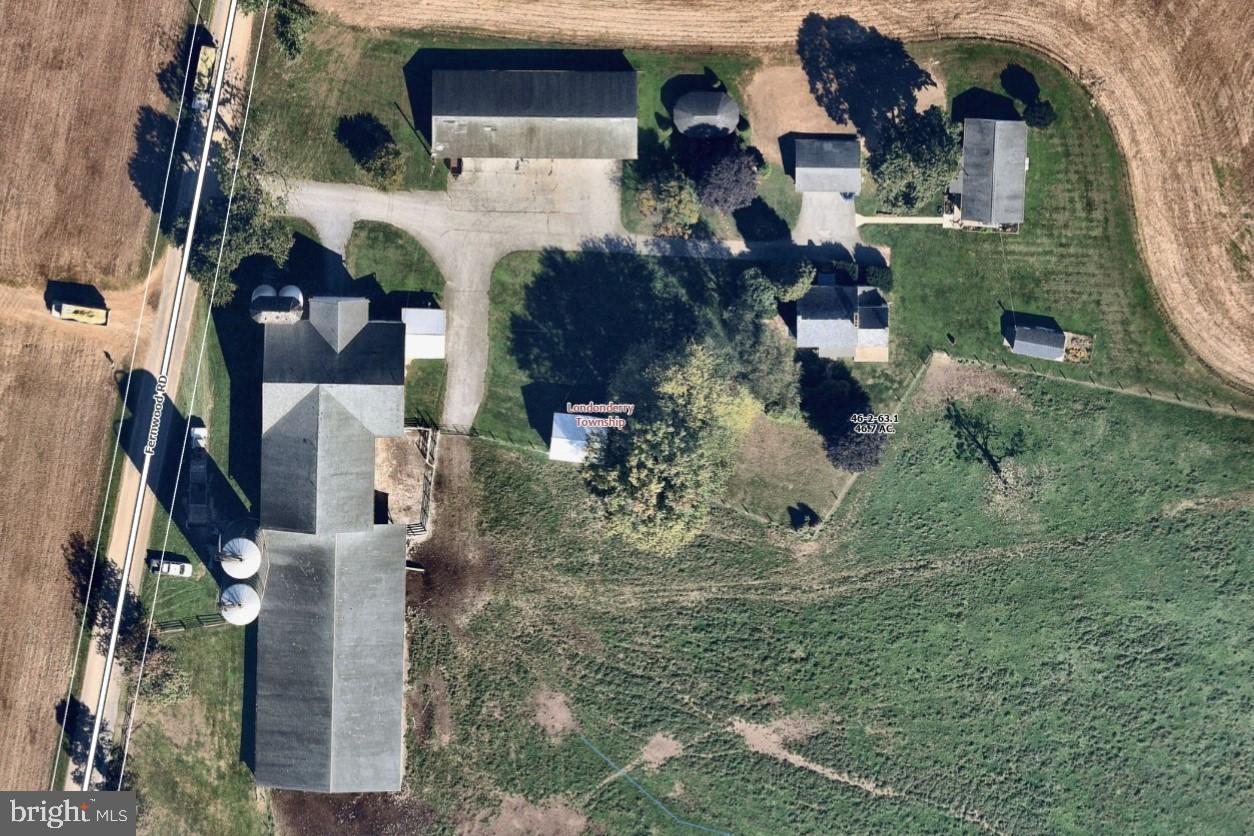 174 Fernwood Road Cochranville, PA 19330 - Photo 1 of 22 Aerial view of a serene rural estate.