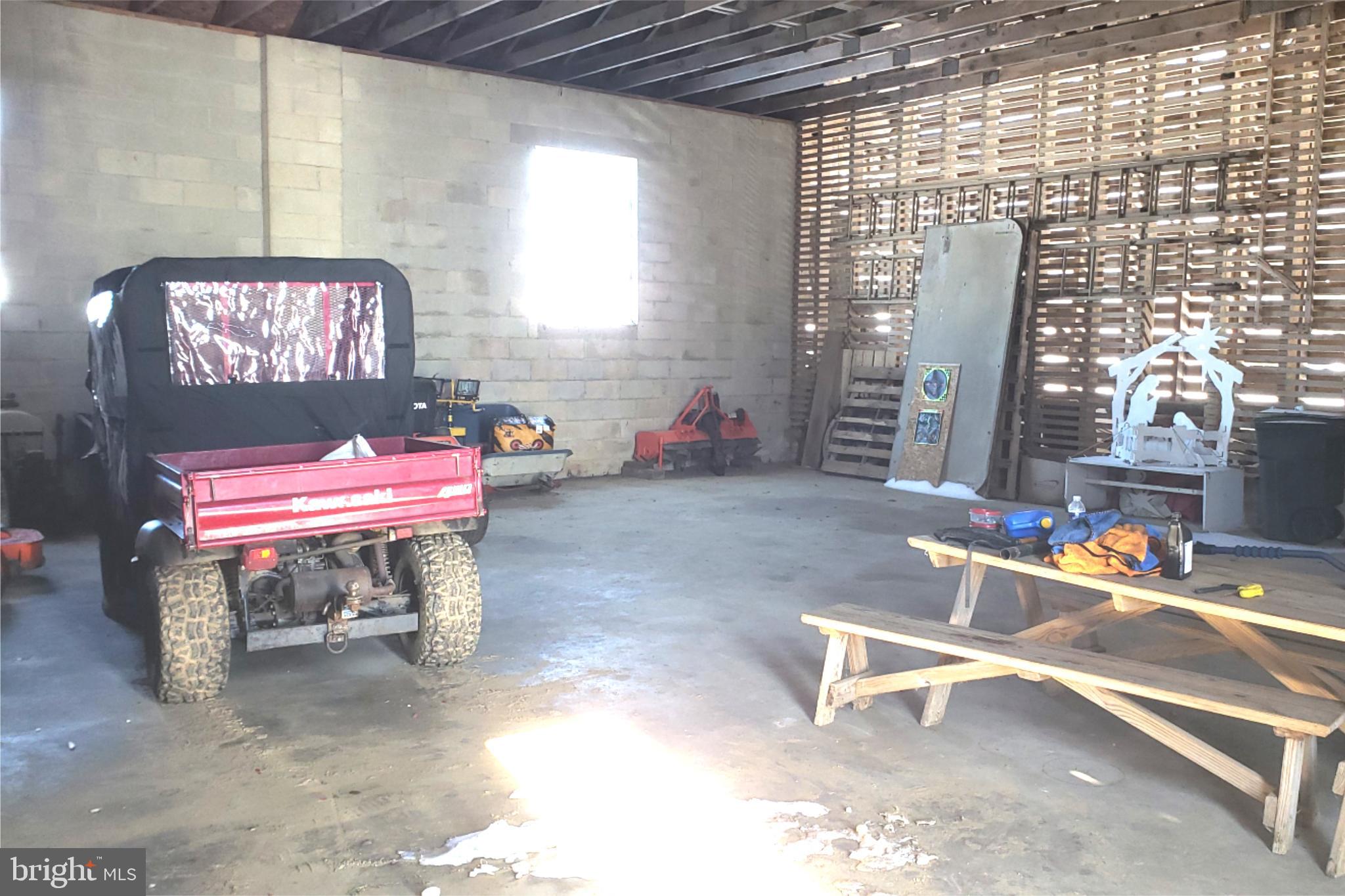 174 Fernwood Road Cochranville, PA 19330 - Photo 19 of 22 Spacious workshop with natural light.