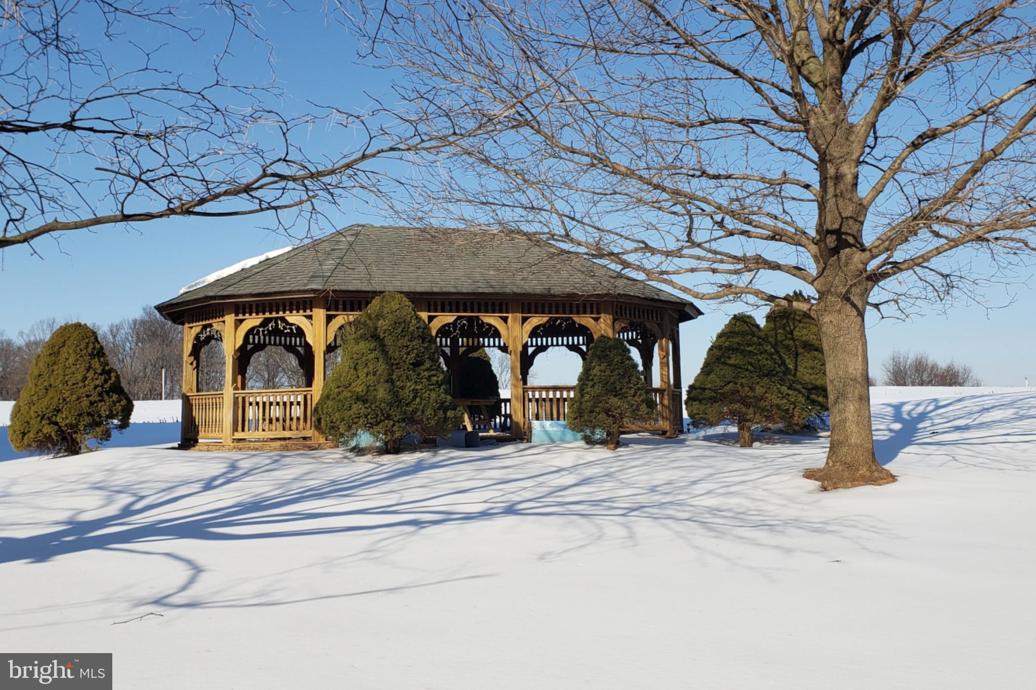174 Fernwood Road Cochranville, PA 19330 - Photo 21 of 22 Charming gazebo nestled in winter's embrace.
