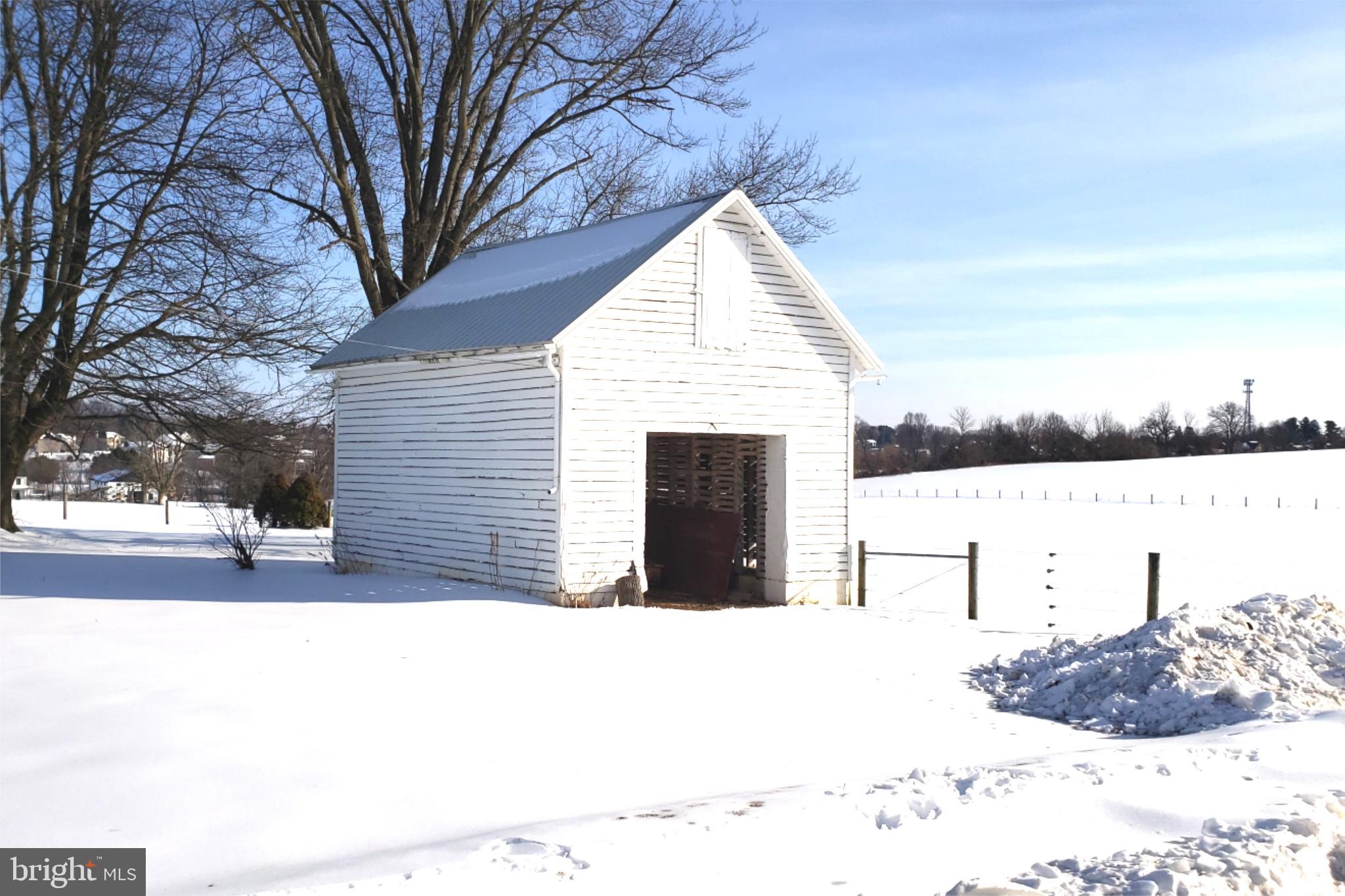 174 Fernwood Road Cochranville, PA 19330 - Photo 22 of 22 Charming barn nestled in a snowy landscape.