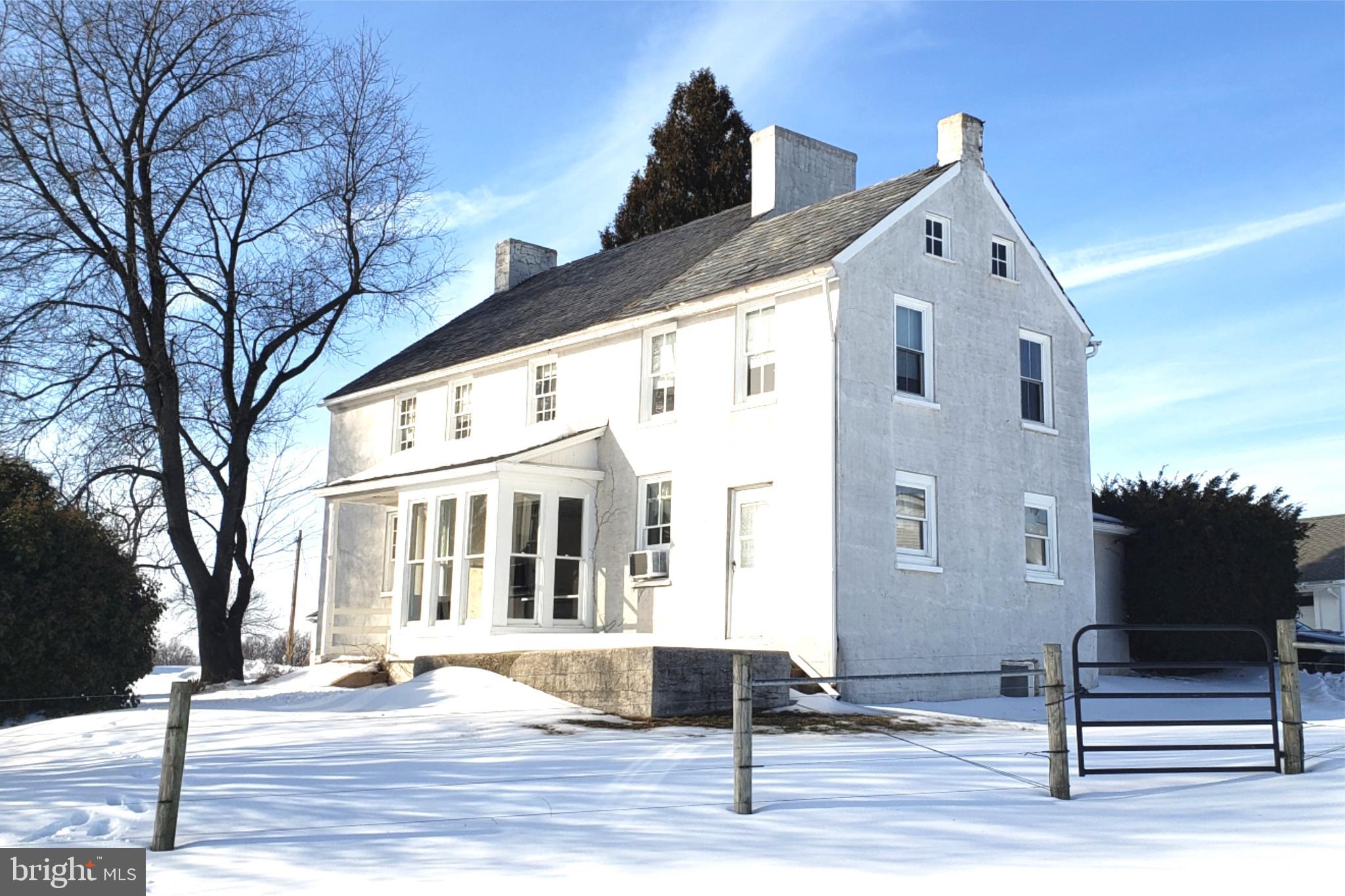 174 Fernwood Road Cochranville, PA 19330 - Photo 3 of 22 Charming white farmhouse in winter's embrace.