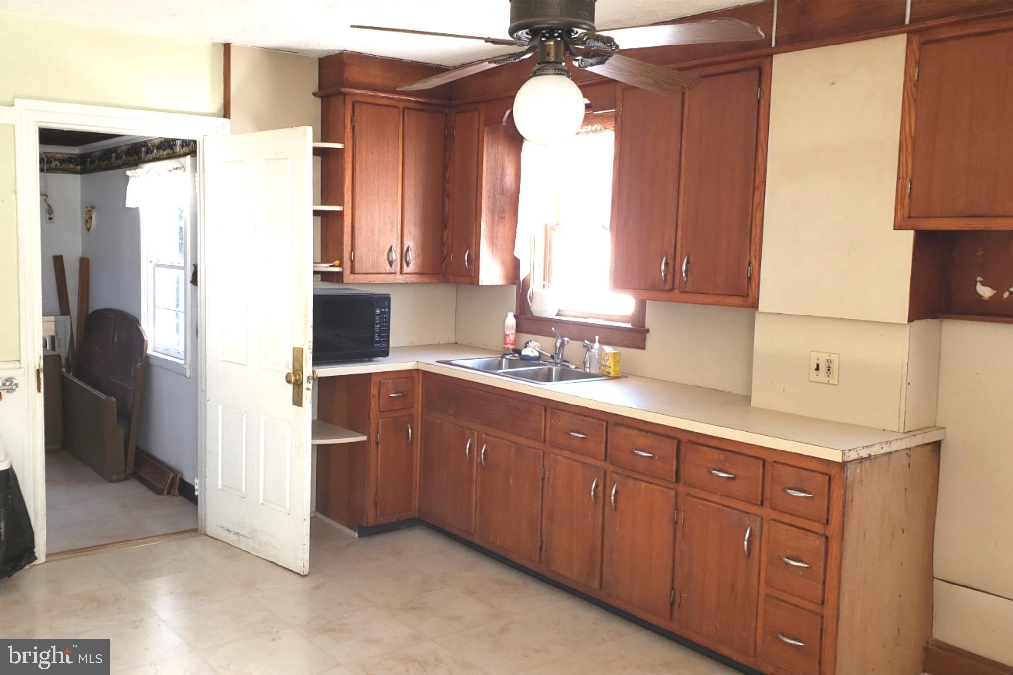 174 Fernwood Road Cochranville, PA 19330 - Photo 4 of 22 Charming kitchen with classic wooden cabinetry.