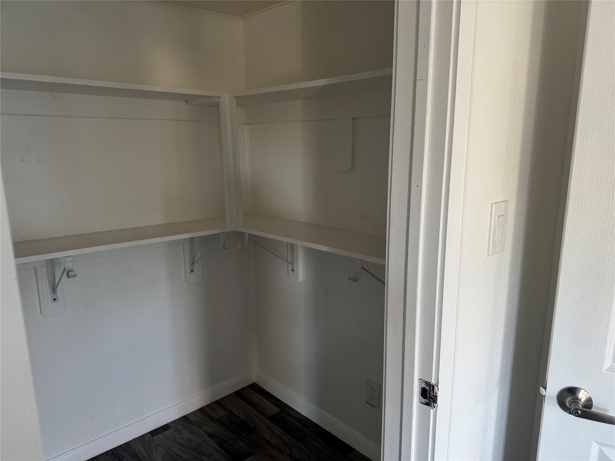 406 7th Street Alvin, TX 77511 - Photo 10 of 14 a view of an empty walk in closet