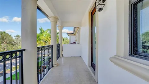 a front view of house with yard and swimming pool