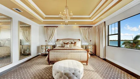 a view of a living room and kitchen