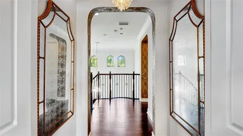 a view of a swimming pool with a lounge chairs